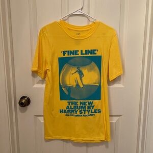 harry styles yellow and blue fine line tee shirt size small.